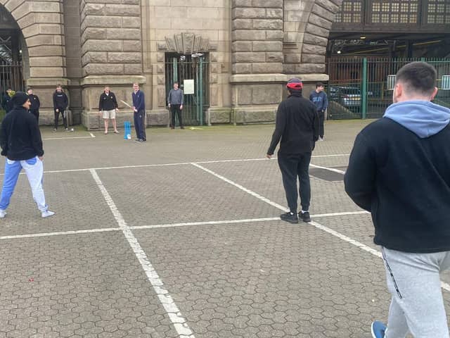 The cricketers passing the time at Dover with an impromptu match (Photo: SWNS)